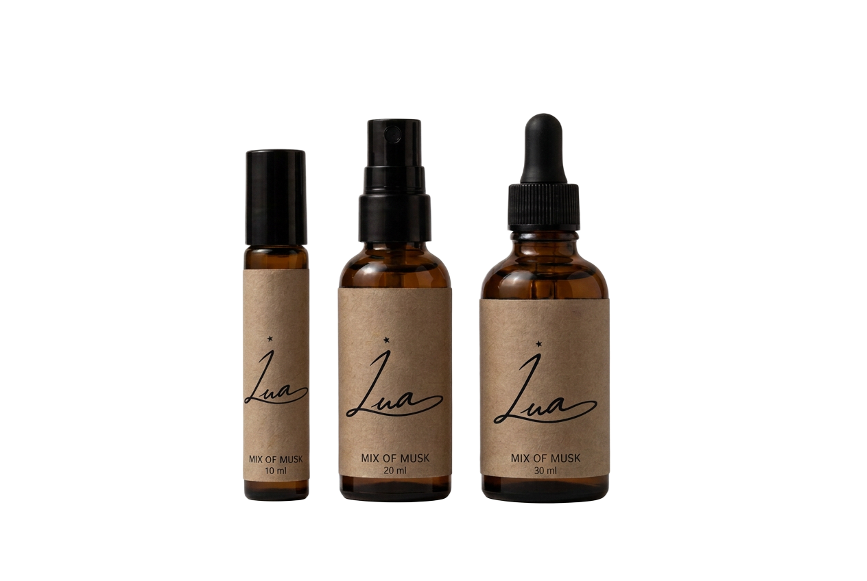 Mix of Musk perfume oil in roller, dropper and elixir bottles